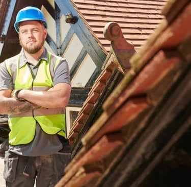 proud roofer posing for the camera