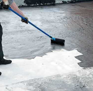 man working on roof substrate