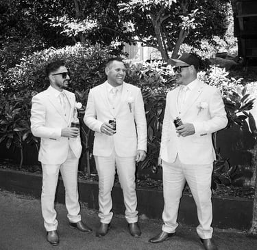 Groomsmen portrait laughing outdoors Avalon Castle Melbourne wedding candid moment