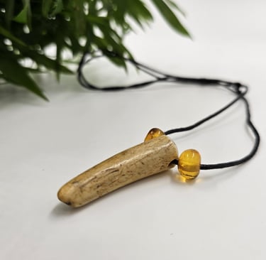 Antler pendant with amber
