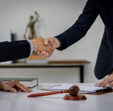 judge shaking hands with lawyer