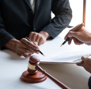 lawyer and client reviewing a document