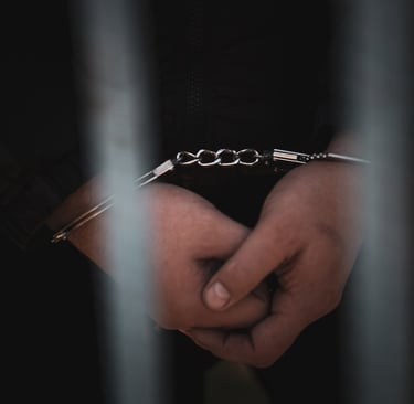 closeup of hands in handcuffs