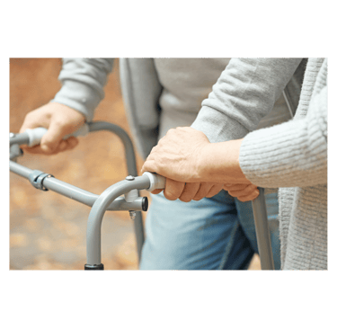 a woman holding a walker frame in her hands
