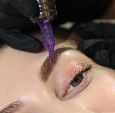 close up of eyebrow microblading on woman