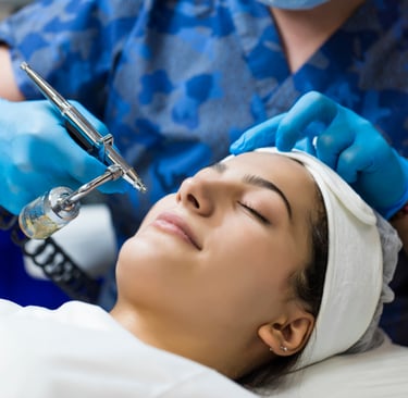 close up of woman getting oxygen facial