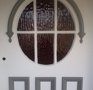 Exterior front door prepared for repainting by PJCPainters
