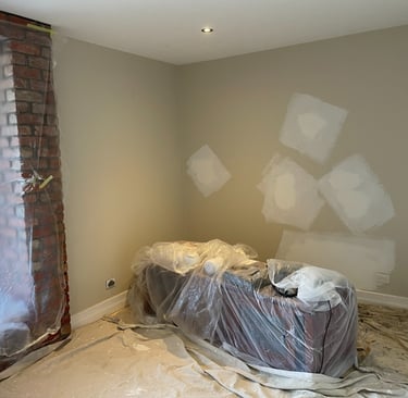 Interior repaint surface preparation in Coorparoo showing patched walls before painting by PJCPainte
