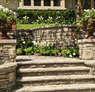 Beautiful stone retaining wall installation by West Linn Concrete, improving landscape design and functionality.