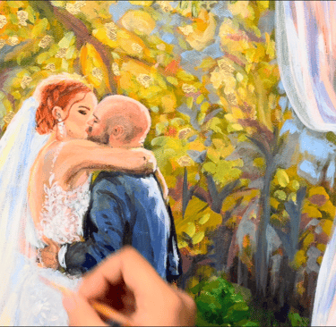 Live wedding painting of couple having their first kiss 