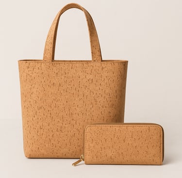 A natural cork fabric tote bag with handles sits behind a matching zippered wallet.