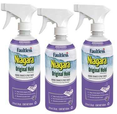 Three bottle of Niagara spray starch on a white background.