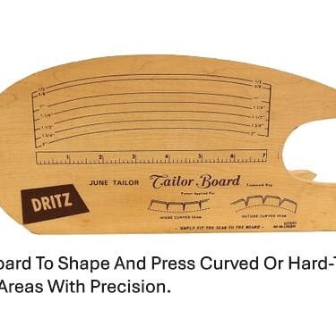 Wooden tailor board with multiple angled edges, curves, and points used for pressing seams, collars,