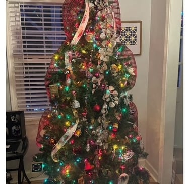 My christmas tree with an invite to a fundraising event.