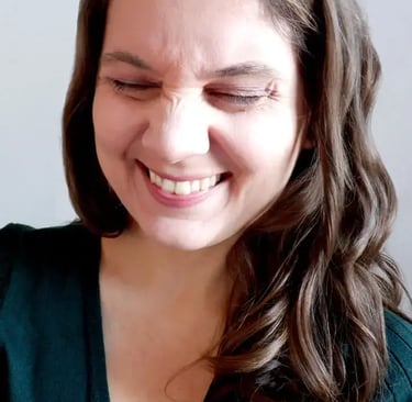 a woman with a smile on her face
