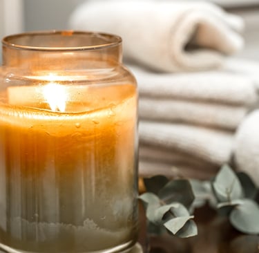 home. a candle with a candle in a glass jar -  click shop button bottom middle of image