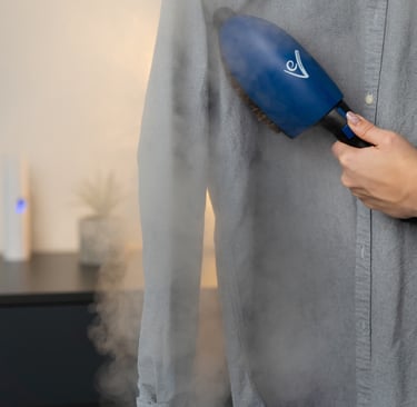 Profesjonalna szczotka parowa EV z naturalnym włosiem, służąca do dezynfekcji i błyskawicznego wygładzania tekstyliów.
