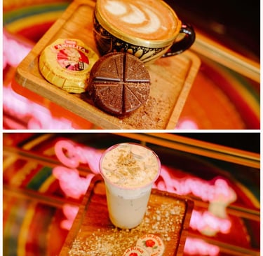 Artisan Mexican latte served with Abuelita chocolate and Mazapan peanut candy on a wooden tray.