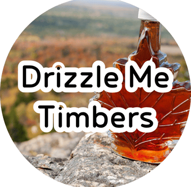 Maple leaf glass bottle filled with syrup on a rock with overlay text reading "Drizzle Me Timbers."