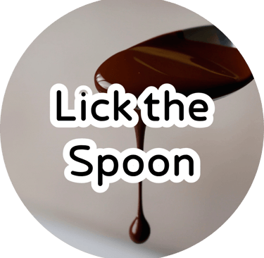 Rich melted fudge dripping off a spoon with white overlay text reading "Lick the Spoon." Decadent chocolate vibe.