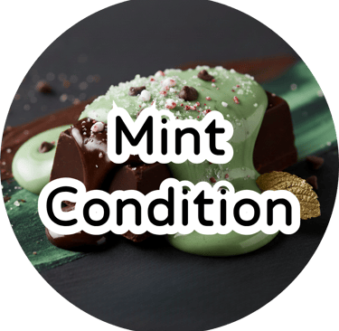 Dark chocolate with creamy green mint icing and sprinkles under text reading "Mint Condition." Rich dessert vibe.