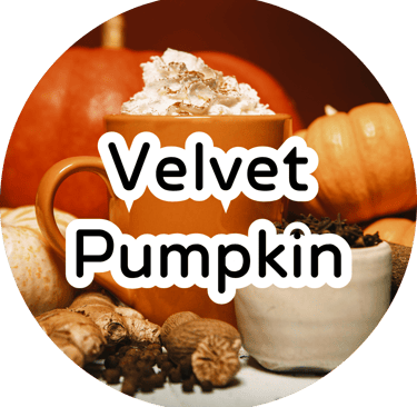 An orange mug of hot pumpkin spice drink topped with whipped cream, surrounded by whole pumpkins, ginger, and spices.