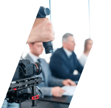 Camera filming corporate video.