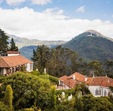 Panoramic view of lush green Andean mountains from the top of Monserrate during a private nature tour