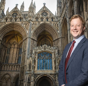 Paul Bristow, Mayor of Cambs and Peterborough, standing in from of Peterborough Cathedral.