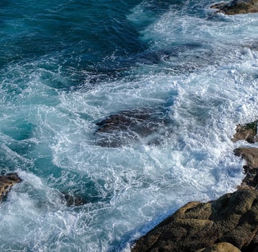 Waves crashing on rocks