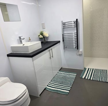 Full interior of a modern temporary bathroom pod available for rental during insurance claims and renovation projects.