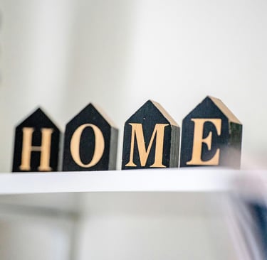 Wooden blocks spelling the word 'home'