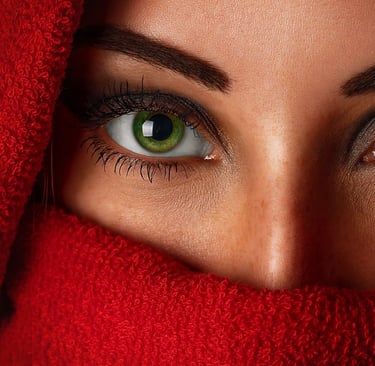 A close-up image of a woman with upturned eye shape.