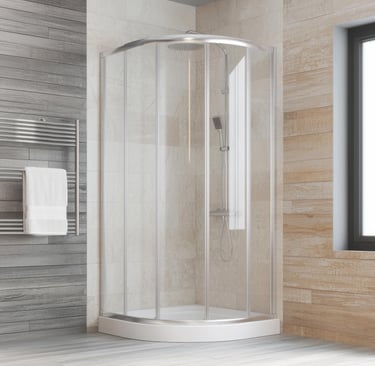 Modern bathroom with curved glass shower enclosure and chrome shower head in Auckland home