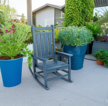 Grey outdoor oversized rocking chair by SERWALL for porch, patio, lawn, or garden seating.