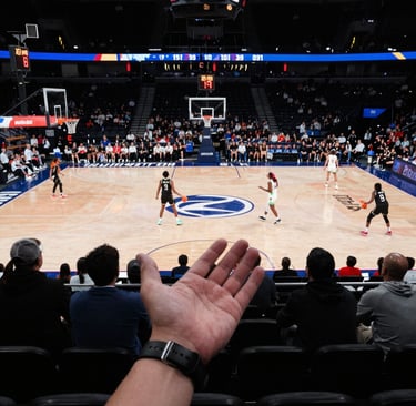 A dynamic action shot of a soccer player mid-kick under stadium lights.
