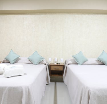 Habitación con dos camas matrimoniales en Bungalows a pie de playa en los ayala nayarit