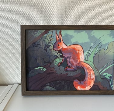 Framed illustration of a red squirrel sitting on a mossy branch in a forest.