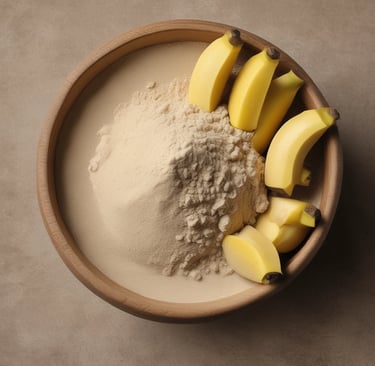 Close-up of bright yellow banana powder spilling from a rustic wooden spoon onto a textured surface