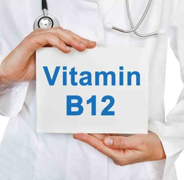 man hodling sign with B12 written on it