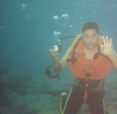 Captain Essam in Navy With old diving equipment 
