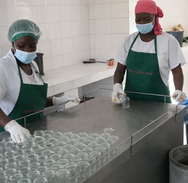 two women in masks and masks on a counter