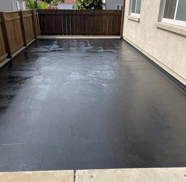 Construction tools and materials neatly stacked at a building site.