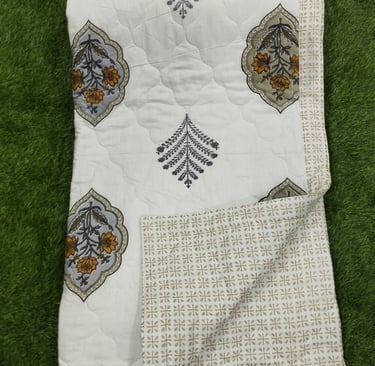 Close-up of a premium machine-quilted Jaipuri Razai winter comforter manufactured in Jaipur, Raj.