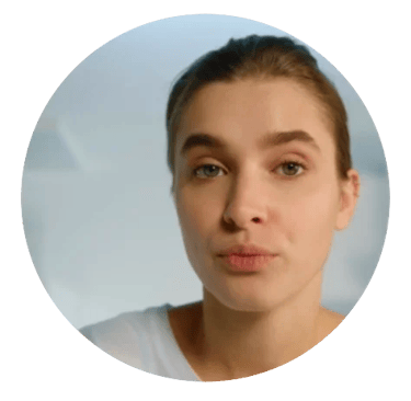 Young women headshot, with light brown hair pulled back.