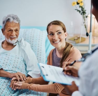 Trusted health insurance advisor assisting a senior citizen with medical coverage and hospital benef