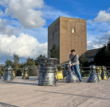 Giant chessboard inside Lorca Castle. In the background, the Alfonsí Tower, erected in the 13th cent
