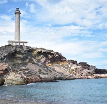 View of the Cabo de Palos lighthouse from Calafría beach.