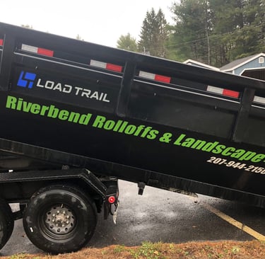 Black Load Trail dump trailer for Riverbend Rolloffs and Landscape equipment hauling.
