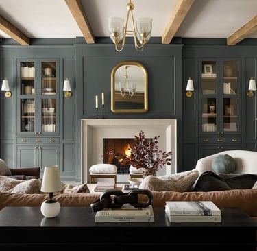 Cozy farmhouse living room with neutral sofa, wood coffee table, and layered textures